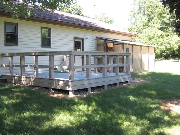 View of deck and greenhouse