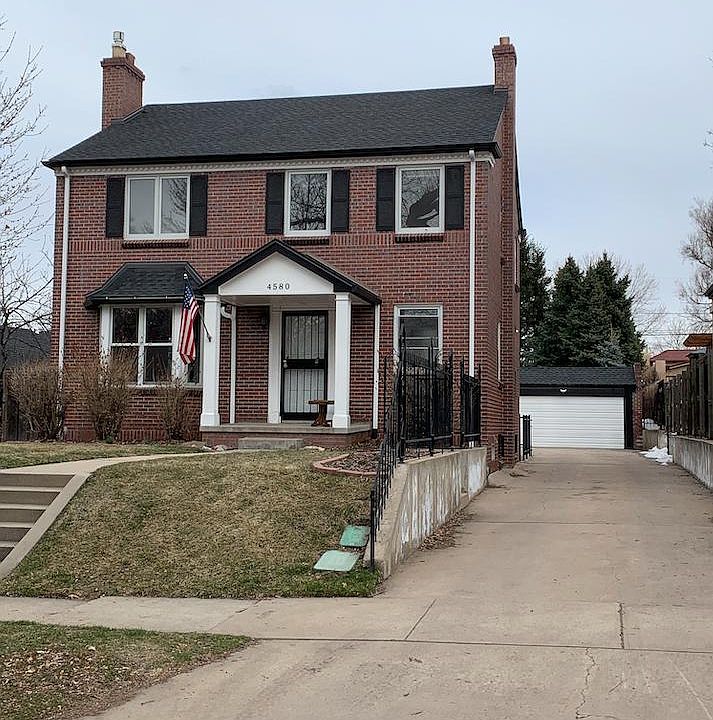 Beautiful Colonial House, North Denver in coveted Grandview neighborhood. Faces West with very long driveway.
