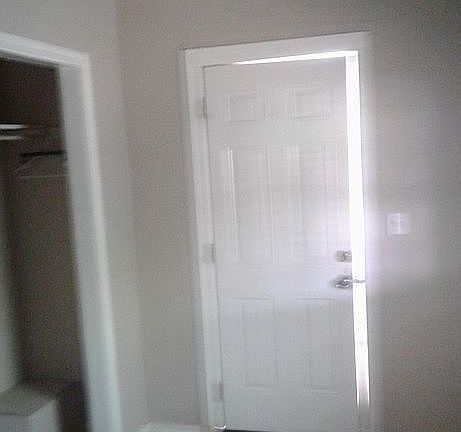 Bedroom and back entrance
