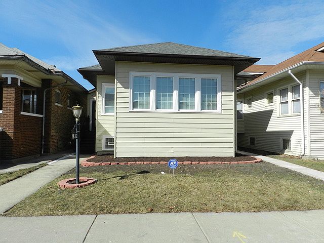 1st image of 1432 N Menard Ave