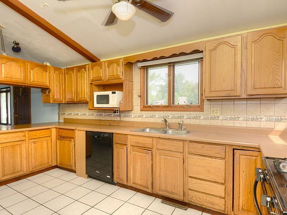 Wood Cabinetry and Vaulted Ceilings