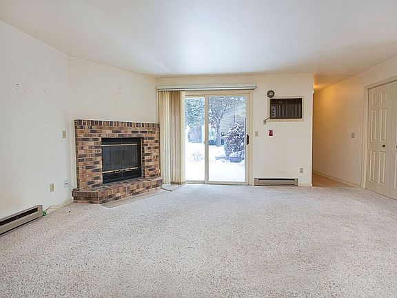 w/ fireplace & slider to patio