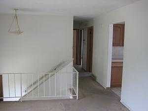 View of front entrance and hallway to bedrooms