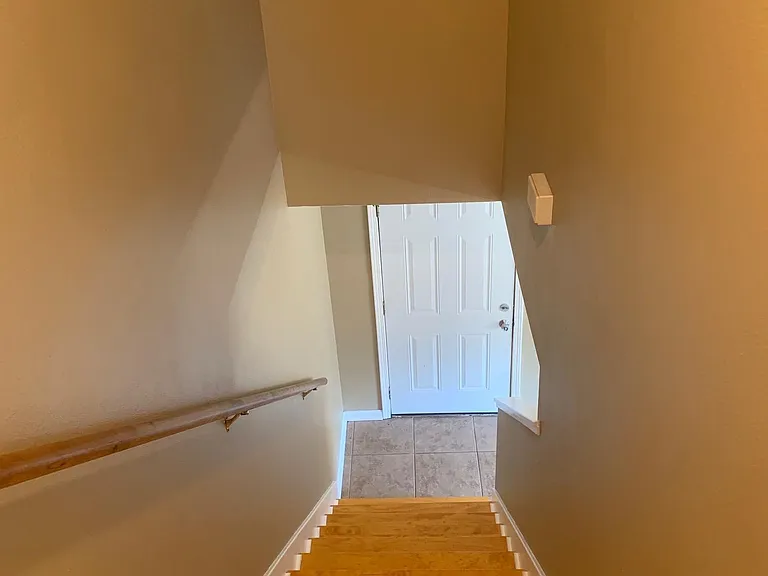 view of stairs back down to lower level