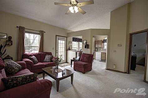 You'll marvel at the feeling of light and spaciousness of the free-flowing floor plan from within this Great Room. Special features include: high soaring cathedral ceiling, walkout onto the spacious back deck, clean carpet where shoes are not allowed, pass through ledge into the breakfast room and stained base boards and door jams throughout.  Come see the undeniable value this house has to offer.