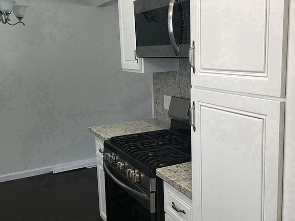 cabinet includes pull out spice rack