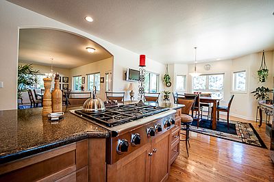 Chef's kitchen with Stainless steel appliances and granite