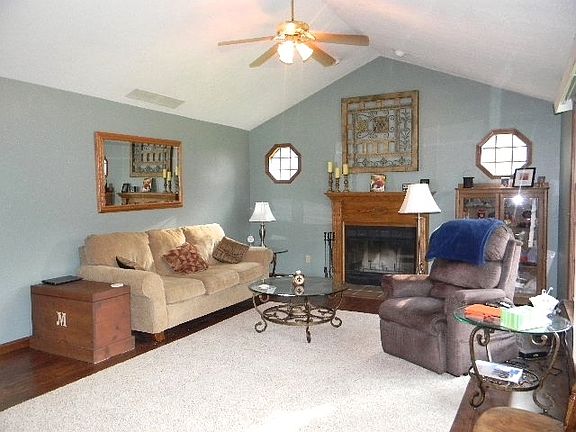 Updated floors, vaulted ceiling and wood burning fireplace.