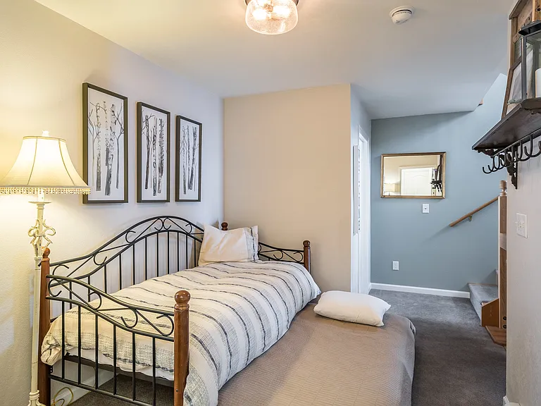 Trundle bed in common area between Bedrooms 2 and 3. Bottom easily pulls out so can fit 2 people in total on two twin beds and push it away during the day.