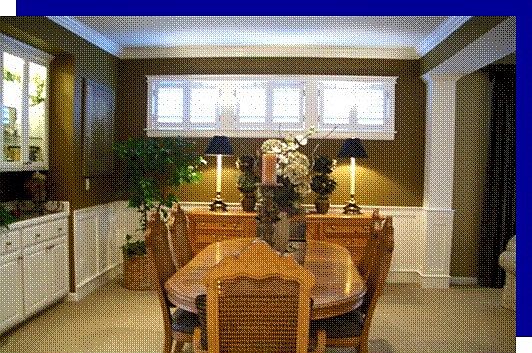 Diningroom has builtin hutch and waintscotting