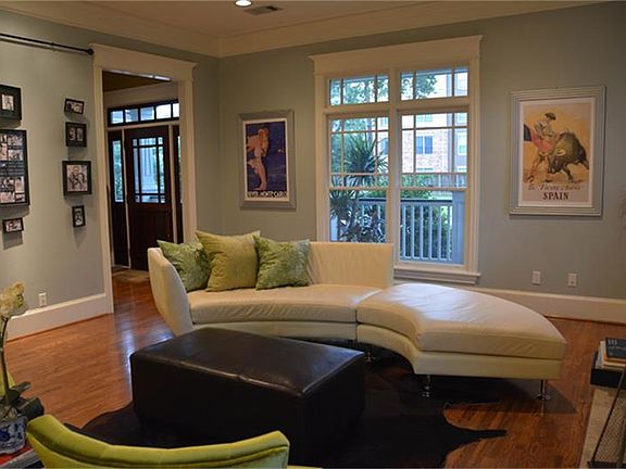 Leaded front door opens to bright, spacious formal living room.