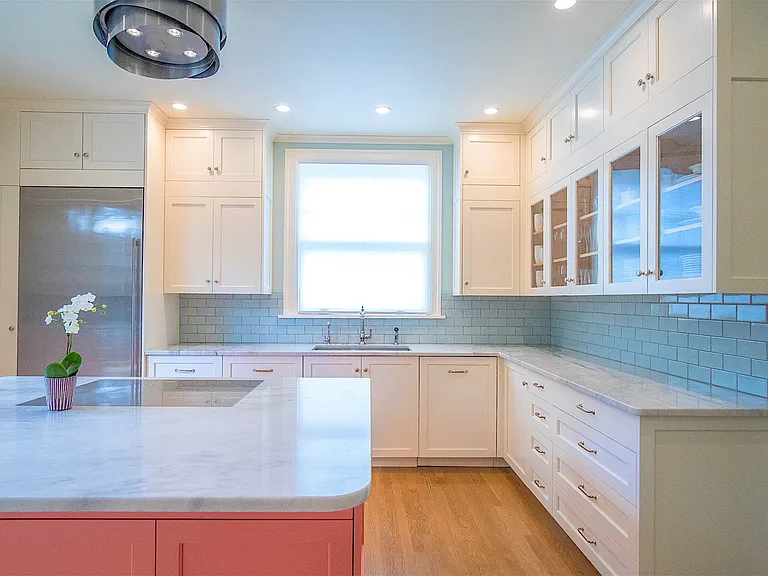 Great-sized custom kitchen. Induction cooktop on island.