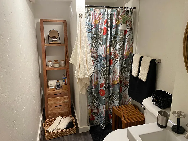 Basement has finished recreation room, bathroom with shower and laundry room