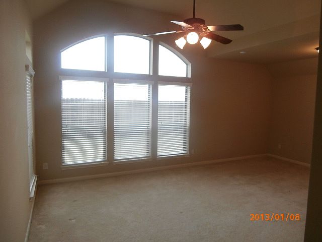 Master Bedroom with floor to ceiling windows