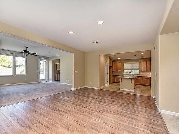 dining view toward family/kitchen (floor in dining/living been upgraded to laminate)