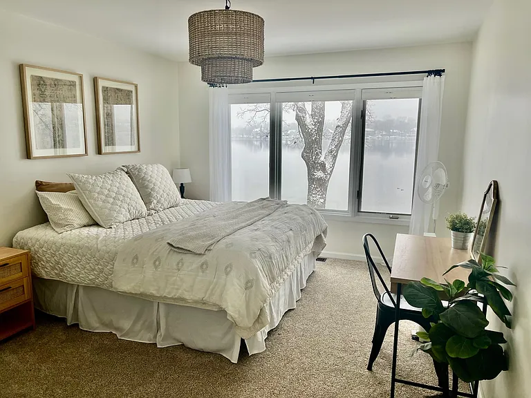Bedroom 1 complete with work area and lake views