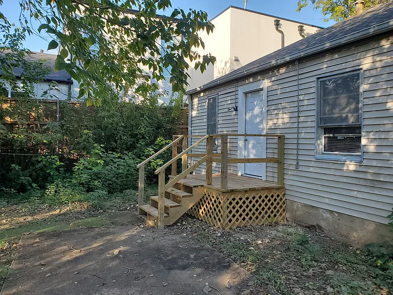 Small deck in back yard.