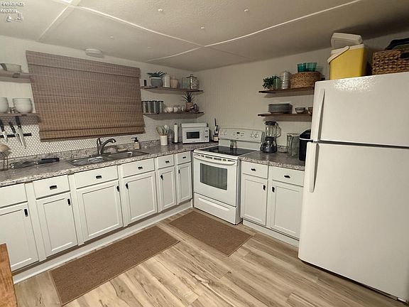 2nd image of 1623 NE Catawba Rd Lot 129
