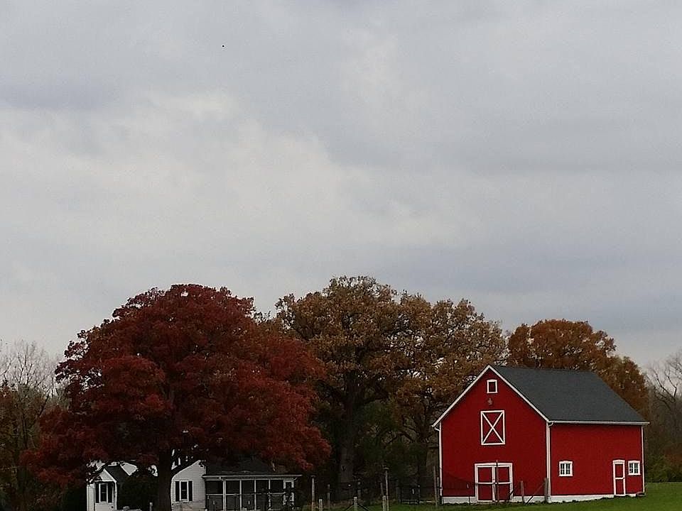 Lovely farm home with outbuilding.