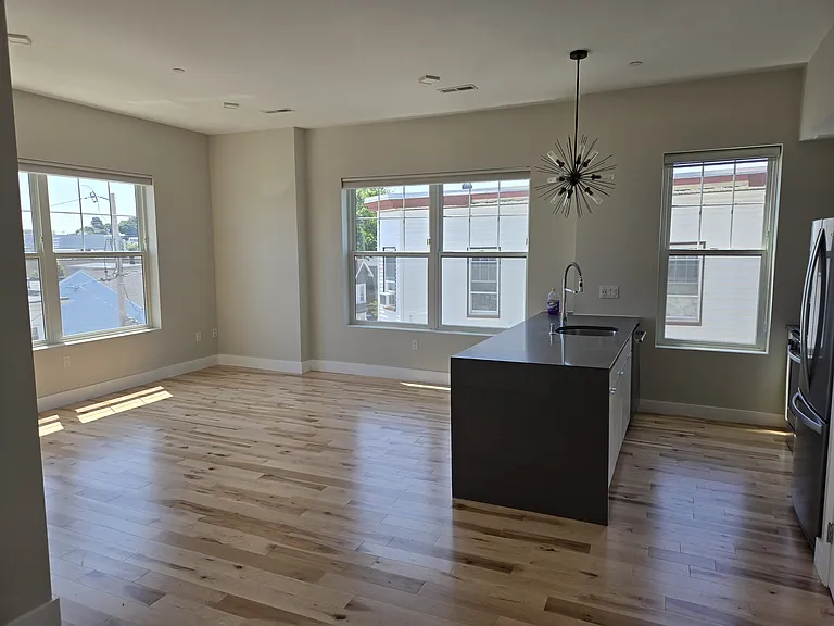 Kitchen and main living space (current photo).