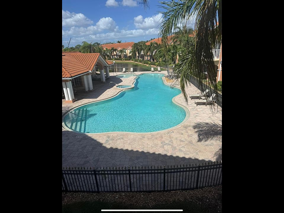 Clubhouse area with pool, hot tub, and fitness center.
