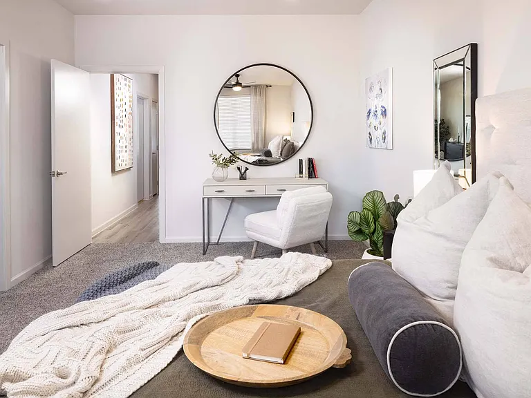Unwind in style with a thoughtfully designed bedroom, offering warmth and privacy.