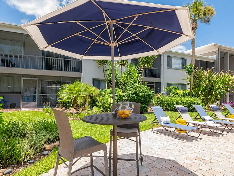 Discover versatile seating options on the paved pool deck.