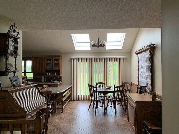 Dining w/cathedral ceiling
