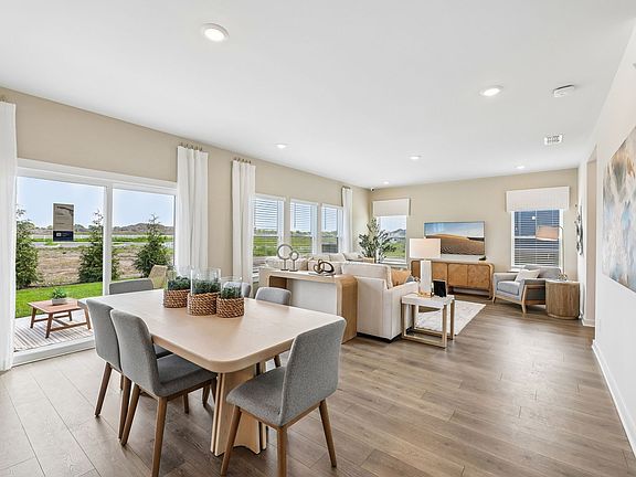 The open-concept floorplan allows for an easy flow between the kitchen and dining areas.