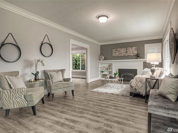 Visually stunning interior has been newly updated throughout. Tall ceilings throughout the main floor give the interior an added sense of spaciousness.