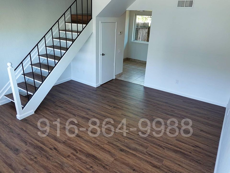 Living room with open staircase
