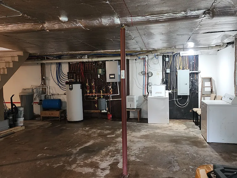 Full shared cellar with separate laundry and locked storage room.