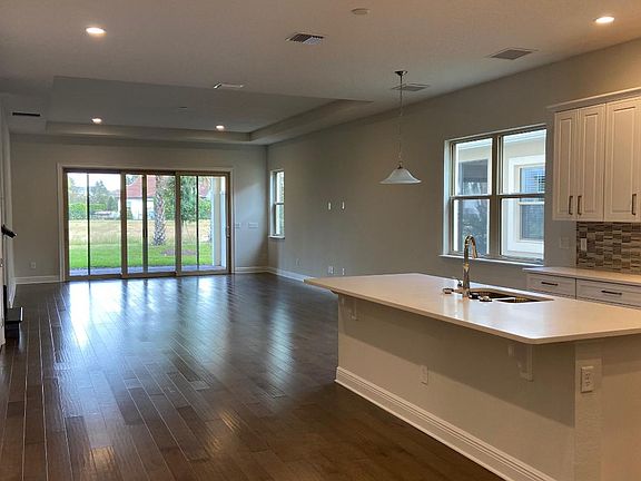 Open-concept great room and dining area