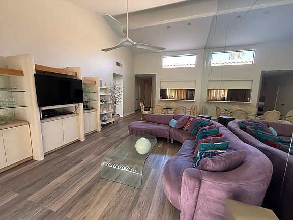 Spacious Living Room with TV, Huge Casablanca Fan (plus A/C), Entertainment Center, on the Fairway