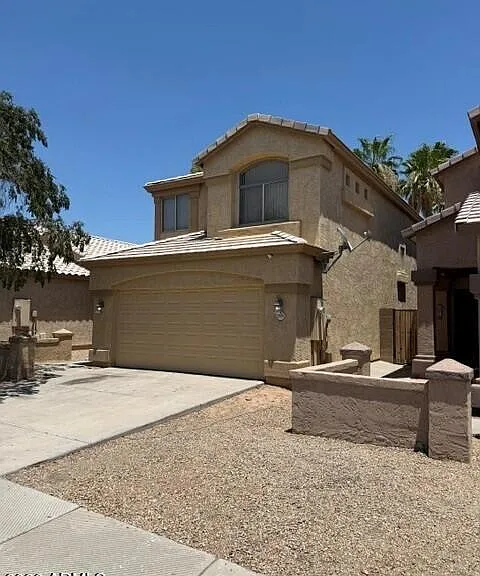 1909 N 106th Ln — Photo 1