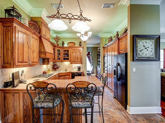 Granite bar, cypress cabinet