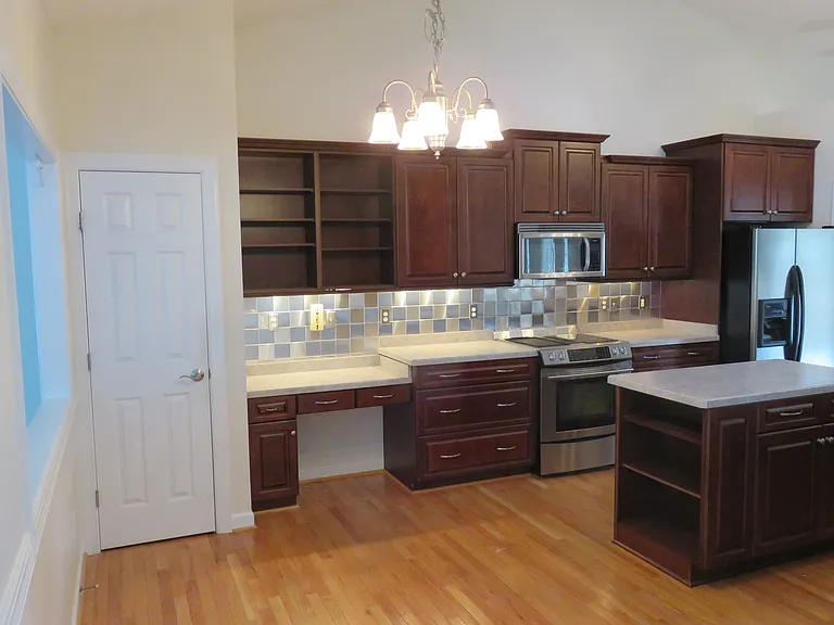desk/coffee station and pantry with shelves