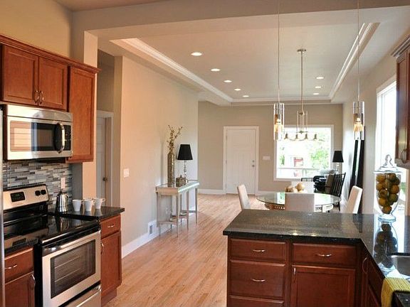 New kitchen with stainless steel appliances. Easy access to the back yard for BBQ and gatherings.
