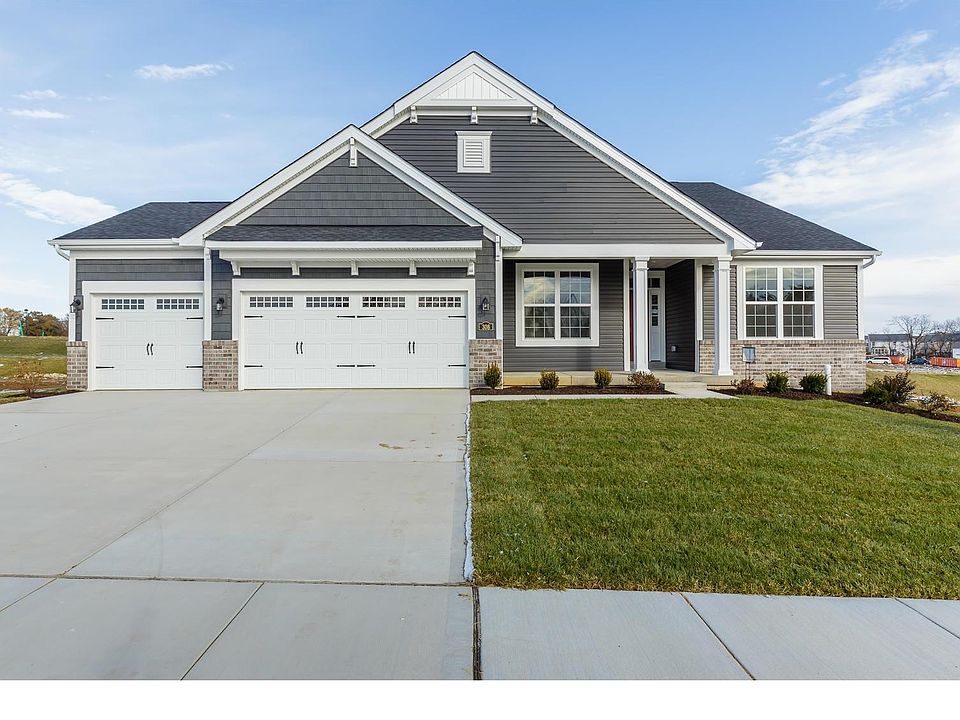 Charming Front Elevation with a 3 Car Garage