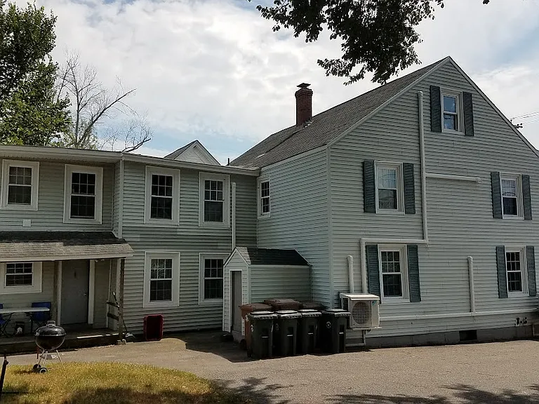 side view, showing common laundry access