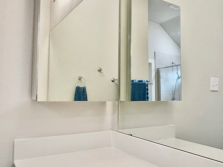 3 shelf Mirrored Medicine cabinet for extra storage.