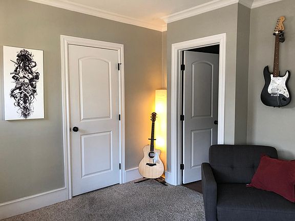 Living Room view of Half Bathroom