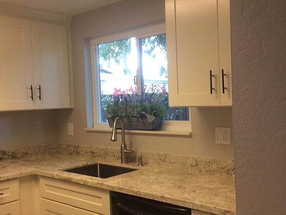 Kitchen with granite countertop