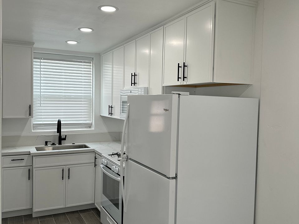 Remolded kitchen with new lighting and kitchen cabinets and new appliances