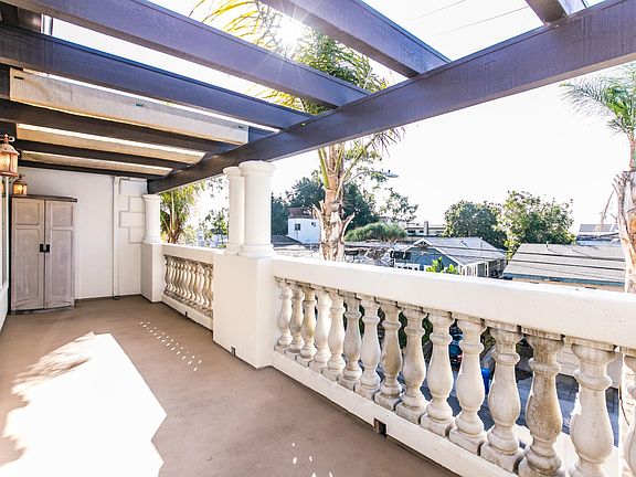 Balcony has room to barbeque, entertain or even work while taking in the cool breeze and salt air