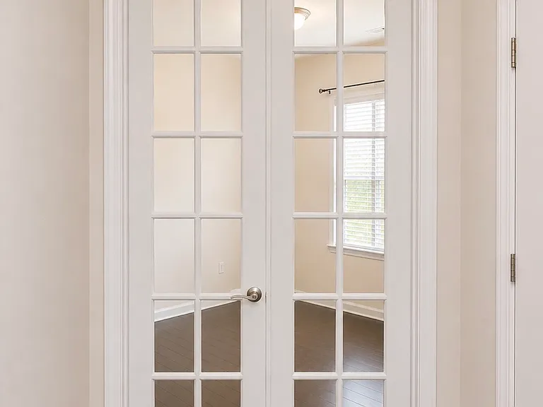 French entry doors into the downstairs office.