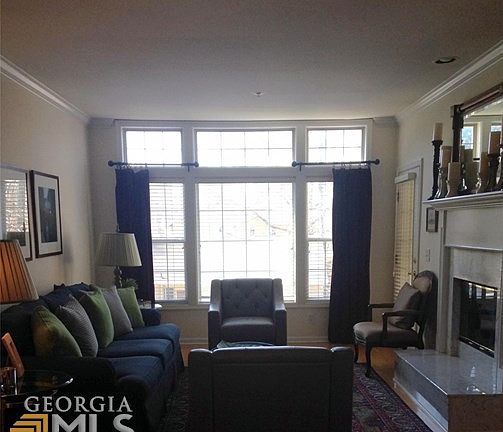 Spacious family room with wall of windows