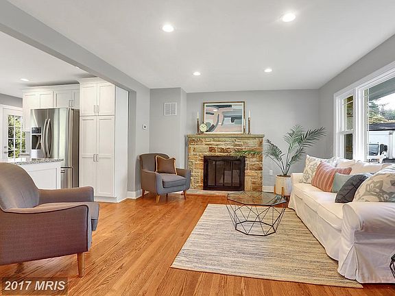 Living Room w/ Wood Burning Fireplace