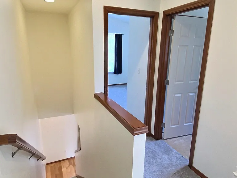 3rd Floor _ Spacious primary bedroom, full bathroom with dual sinks and a large linen closet, plus a second bedroom