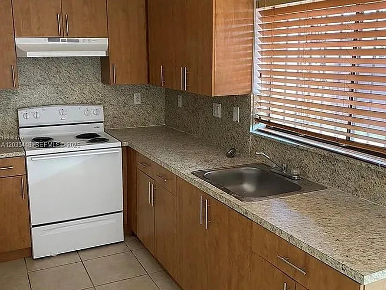 4933 SW 135th Pl #4933 — Photo 1